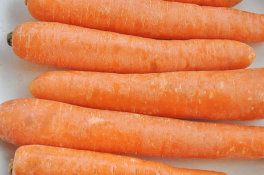 Orange carrot vegetables useful as a background