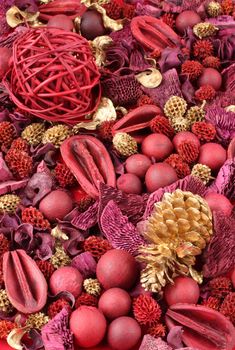 Background of red and golden scented Christmas potpourri.