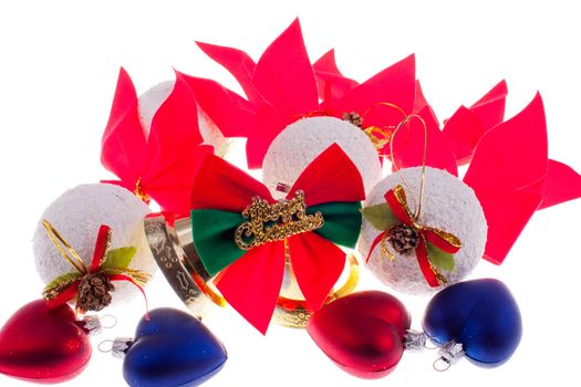 Christmas baubles and other decorations on a white background