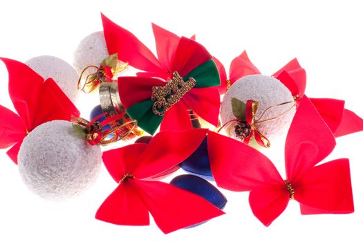 Christmas baubles and other decorations on a white background