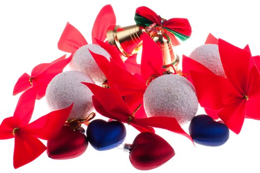 Christmas baubles and other decorations on a white background