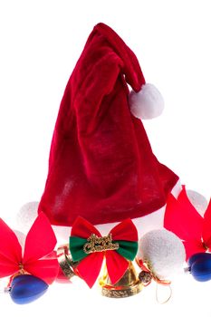 santa hat with New Year's toys on a white background