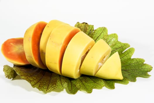 Papaya slice isolated on white background.