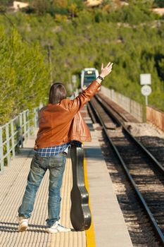 Commuter stopping a small regional train