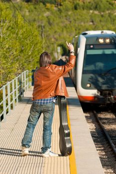 Commuter stopping a small regional train