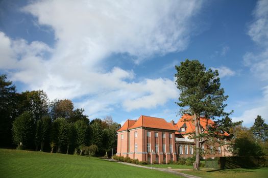 large  house  in brick with a park