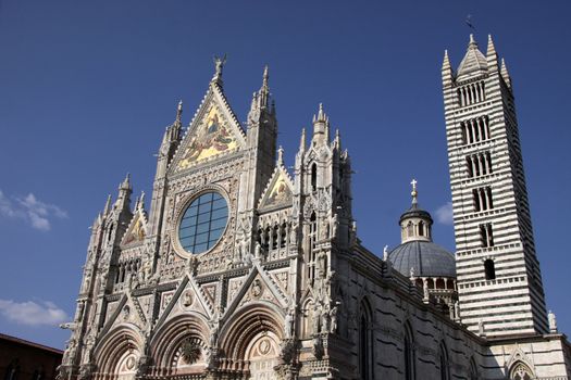 The magnificant cathedral of Siena (Duomo di Siena), shot in Siena, Italy.  The cathedral was constructed between 1215 and 1263.
