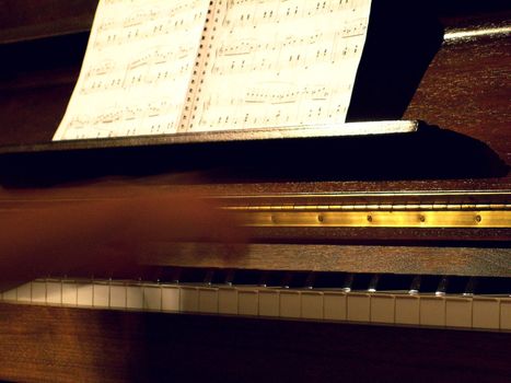 Hands in movement in the piano
