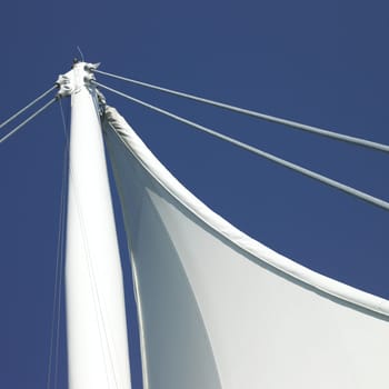 White sails and blue sky