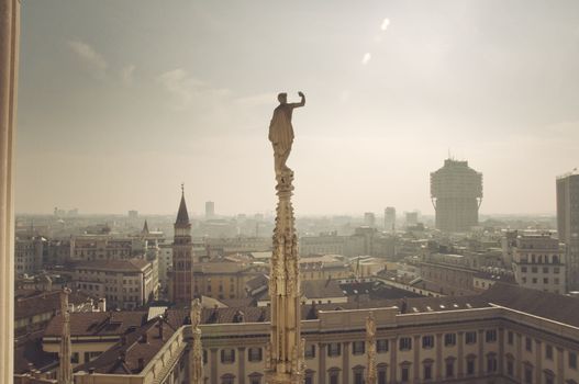 a statue of Duomo in Milan city