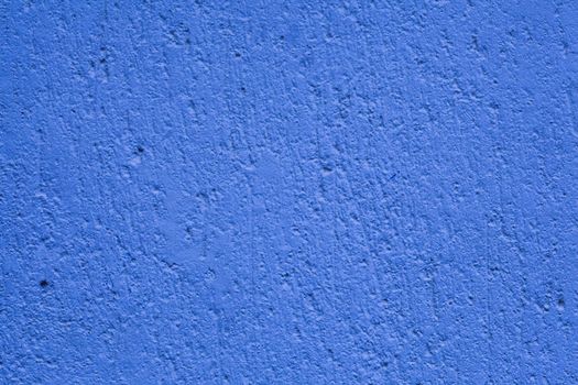A close-up image of a blue wall texture backgroud. Check out other textures in my portfolio.