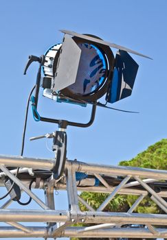 Reflector in an outdoor theater with blue sky background