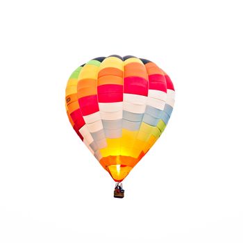 Fire balloon during a foggy day on white background