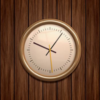 An image of a golden clock on wooden background