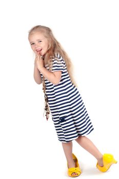 Shot of little cute with mother shoes in studio