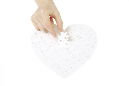   puzzle heart isolated on a white background 