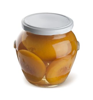 Peach compote with peaches in the glass jar
