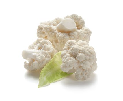 Three pieces of cauliflower with green leaf on the white background