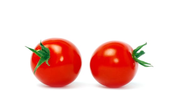 Fresh tomatoes isolated on white
