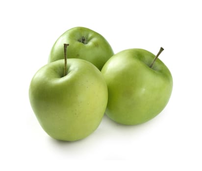 Three fresh green apples on the white background