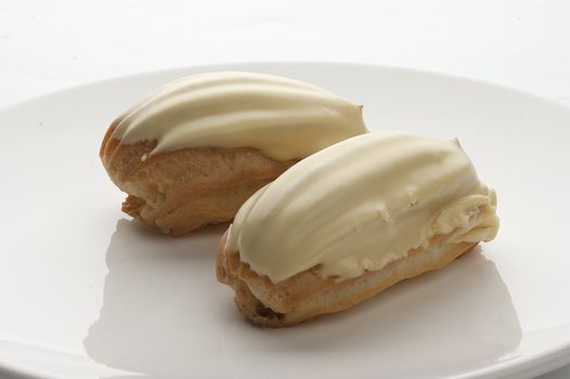 Two cream-filled French pastry on the plate