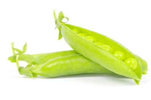 green peas vegetable closeup isolated on white