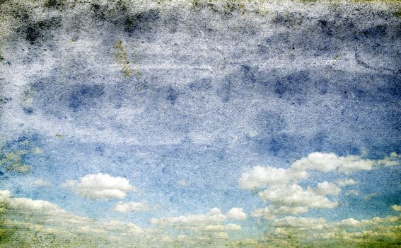 blue sky background with tiny clouds