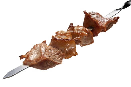 Isolated roasted meat on the metal skewer