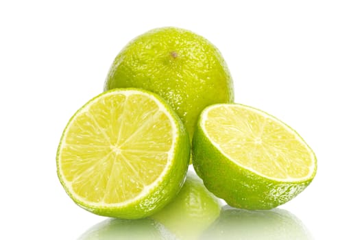 Fresh ripe lime isolated on white background