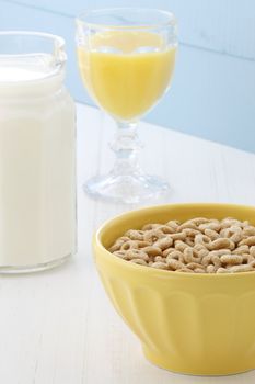 Delicious and nutritious lightly toasted honey, nuts and oats cereal with milk.