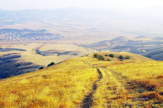 path on mountain meadow in nice day