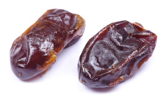 dryed dates on white background