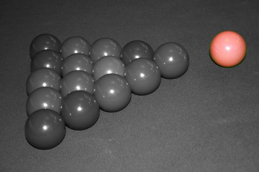 Snooker balls b&w and colour on the pink.
