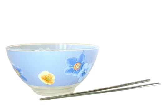 Blue cup and two steel chopsticks. On isolated background.