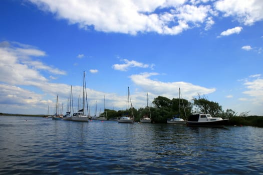 Christchurch river with boats and blue sky.