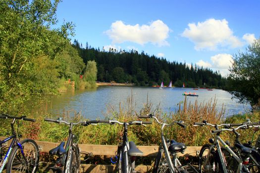 A Lake in the middle of the countryside, with bikes