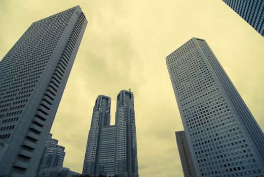 Tokyo skyscrapers background in Shinjuku area with City Hall Building in center, Japan