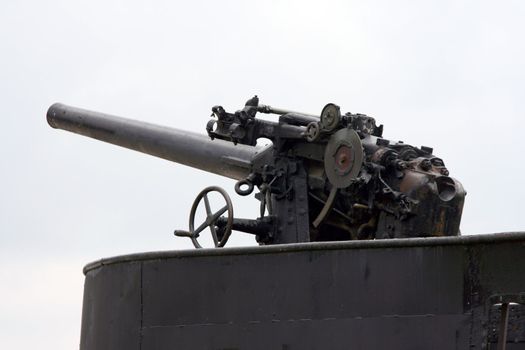 antique fire gun from old navy submarine