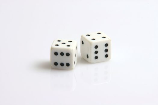 tow six dices on white background toys and leisure items