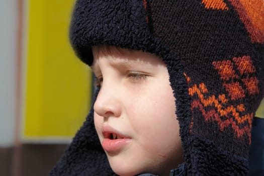 The little boy in a winter cap