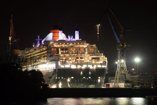 Luxury liner cruise ship 'Queen Mary 2' in dry dock 'Elbe 17' in Hamburg, Germany. November 9th, 2008. All company names deleted.