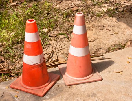 Red traffic cones in line marking a blocked out area