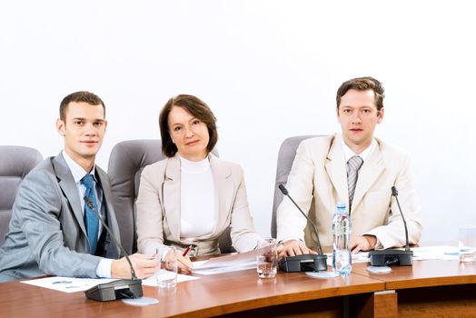 businessmen sitting in a chair at the table, communicate at the conference