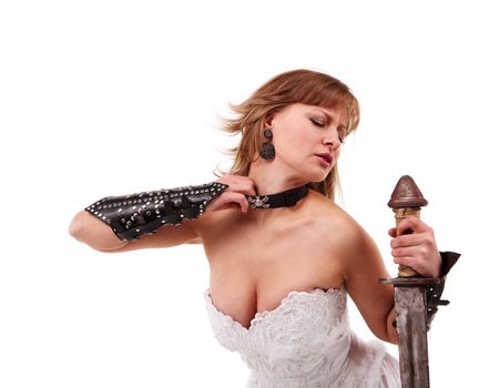 Girl in a wedding dress with a sword on the white background
