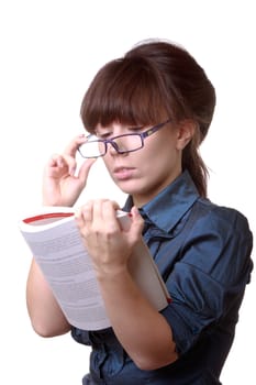 Portrait of young alluring brunette woman, holding book on white background