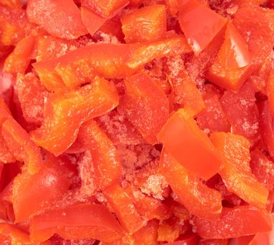 Background.Slices of red bell pepper close-up