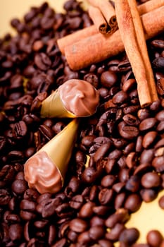 collection of different chocolate pralines truffels on golden brown background macro