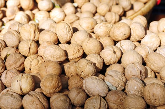 Walnuts in piles