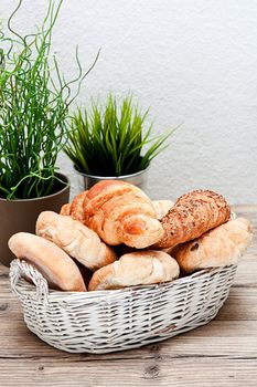 traditional french breakfast in morning on wooden background