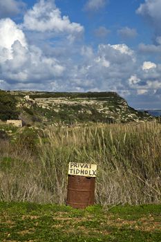 When walking in the countryside i Malta, one is faced with hundred of ad hoc signs saying Private, Do Not Enter, or RTO (short for Riservato in Italian).  Most of these signs are illegally placed, and the land in question most of the times is in fact public land.